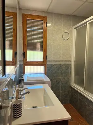 Un baño de APARTAMENTO LA MURALLA 2
