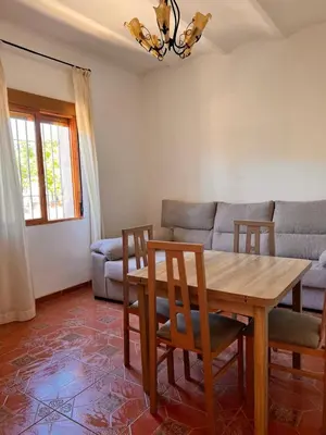 Zona de estar de APARTAMENTO LA MURALLA 2