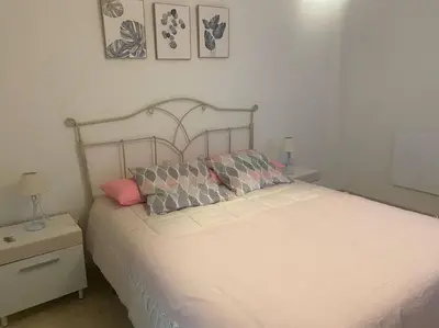 Cama o camas de una habitación en Céntrico