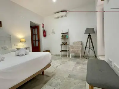 Cama o camas de una habitación en Geysotur Rincón del Sacristán