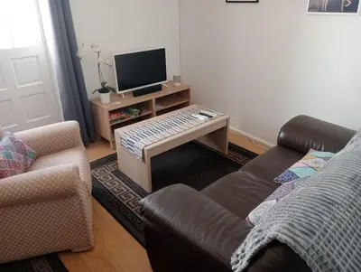 Una televisión o centro de entretenimiento en The Corner Terraza