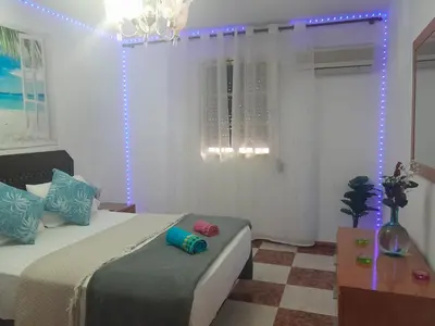 Cama o camas de una habitación en Disfruta de un barrio tranquilo