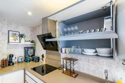 Una cocina o zona de cocina en Apartamento a 500m de la Judería con Parking
