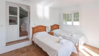 Cama o camas de una habitación en Cortijo Vallehermoso Campillos by Ruralidays