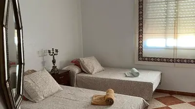 Cama o camas de una habitación en Villa Gení La Victoria by Ruralidays