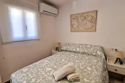 Cama o camas de una habitación en Moderno apartamento Sevilla zona Nervión. WiFi/AC