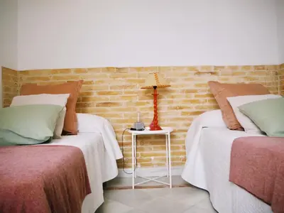 Cama o camas de una habitación en Carmona Center Apartment