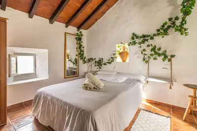 Cama o camas de una habitación en La Tahona (Cortijo Andaluz en las montañas)