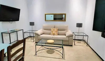 Una televisión o centro de entretenimiento en Lumbreras V Apartamento Alameda Sevilla