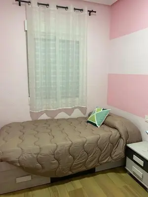 Cama o camas de una habitación en Alojamiento Jaén -S.Ildefonso
