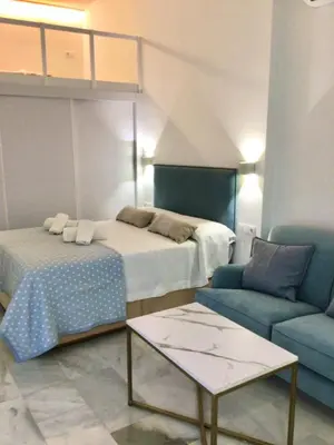 Cama o camas de una habitación en Apart Los Patios de Valladares