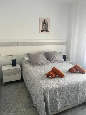 Cama o camas de una habitación en Apartamento Medina Azahara