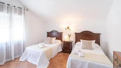 Cama o camas de una habitación en Villa el Señorío Alameda by Ruralidays
