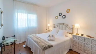 Cama o camas de una habitación en Casa La Solea Cuevas Bajas by Ruralidays