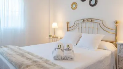 Cama o camas de una habitación en Casa La Solea Cuevas Bajas by Ruralidays