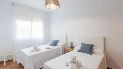 Cama o camas de una habitación en Casa La Solea Cuevas Bajas by Ruralidays