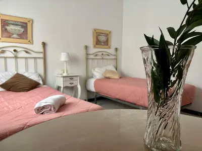 Cama o camas de una habitación en Apartamento Claudio Marcelo, 1