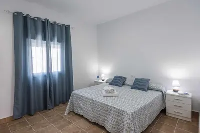 Cama o camas de una habitación en Casa Rural Rafael – Lantejuela