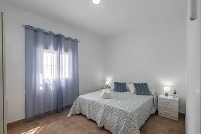 Cama o camas de una habitación en Casa Rural María – Lantejuela
