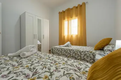 Cama o camas de una habitación en Casa Rural María – Lantejuela