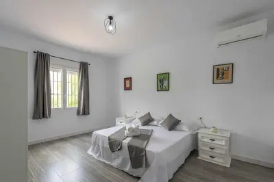 Cama o camas de una habitación en Casa rural Dehesa de las Yeguas
