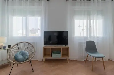 Una televisión o centro de entretenimiento en Apartment in the city center