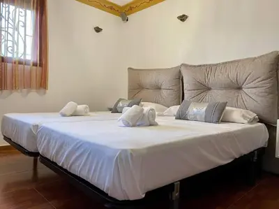 Cama o camas de una habitación en Geysotur Patio de la Mezquita