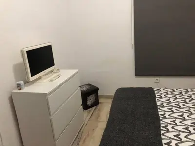 Una televisión o centro de entretenimiento en Casa Con Alma # junto a estación de trenes y muy cerca del centro