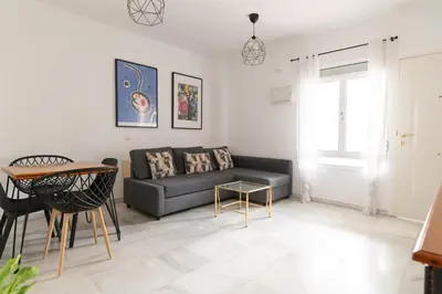Zona de estar de Florencio Quintero Home