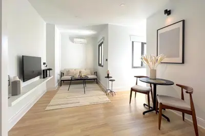Una televisión o centro de entretenimiento en Alohamundi Conde Torrejón - Amazing Penthouse