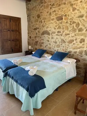 Cama o camas de una habitación en Habitación rural en Posada Los Caballos