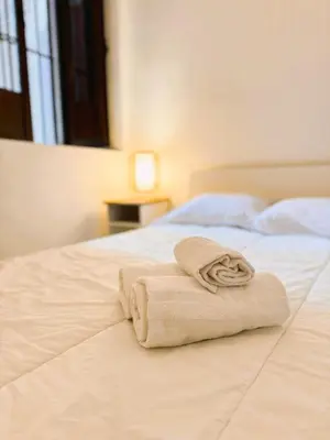Cama o camas de una habitación en Apartamento tranquilo en barrio bohemio