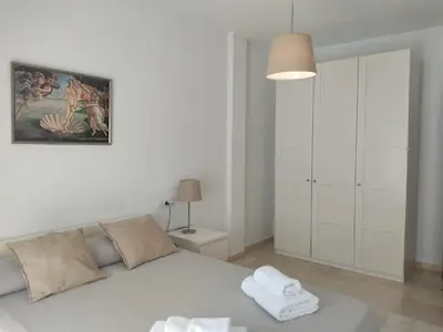 Cama o camas de una habitación en Casa Almazara con aparcamiento