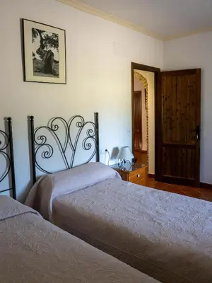 Cama o camas de una habitación en Cortijo Charcollana