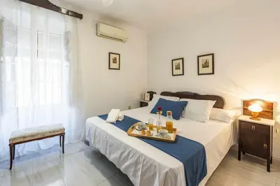 Cama o camas de una habitación en Casa Rural Berraquero