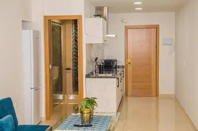 Una cocina o zona de cocina en Apartamentos centro Sandoval