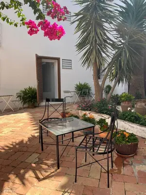 Jardín al aire libre en Clarisas Suites