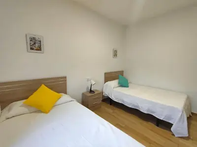 Cama o camas de una habitación en Apartamento Acerota, con parking gratuito