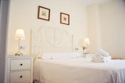 Cama o camas de una habitación en Ramón y Cajal by TheGoodTourist