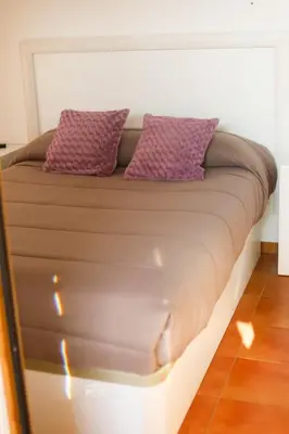 Cama o camas de una habitación en Hospedium DLJ Arjona Centro II
