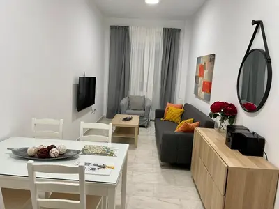 Una televisión o centro de entretenimiento en Geysotur Puerta de Magdalena