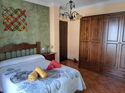 Cama o camas de una habitación en Casa El Albero (Torcal-Caminito del Rey)