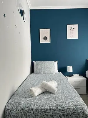 Cama o camas de una habitación en Apto Familiar Balcones a la Muralla