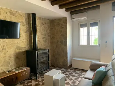 Una televisión o centro de entretenimiento en Casa Genilla