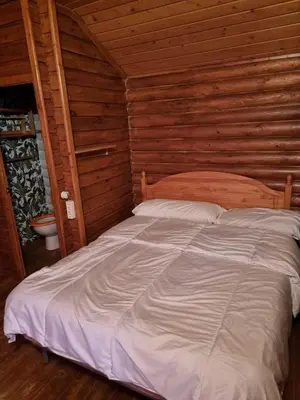 Cama o camas de una habitación en Camping Fuente de Piedra