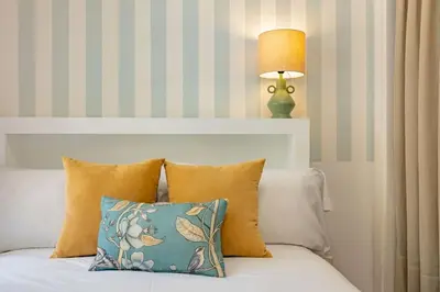 Cama o camas de una habitación en Conde Ibarra Deluxe By Valcambre