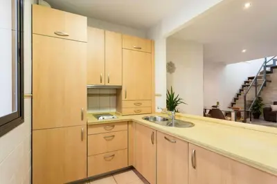 Una cocina o zona de cocina en Ático Terraza Privada. Centro Ciudad