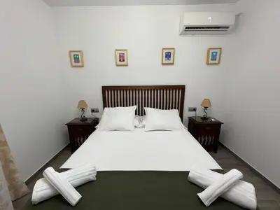 Cama o camas de una habitación en Azahar Macarena