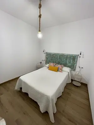 Cama o camas de una habitación en Apartamentos Casa el Gorras