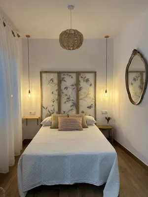 Cama o camas de una habitación en Apartamentos Casa el Gorras